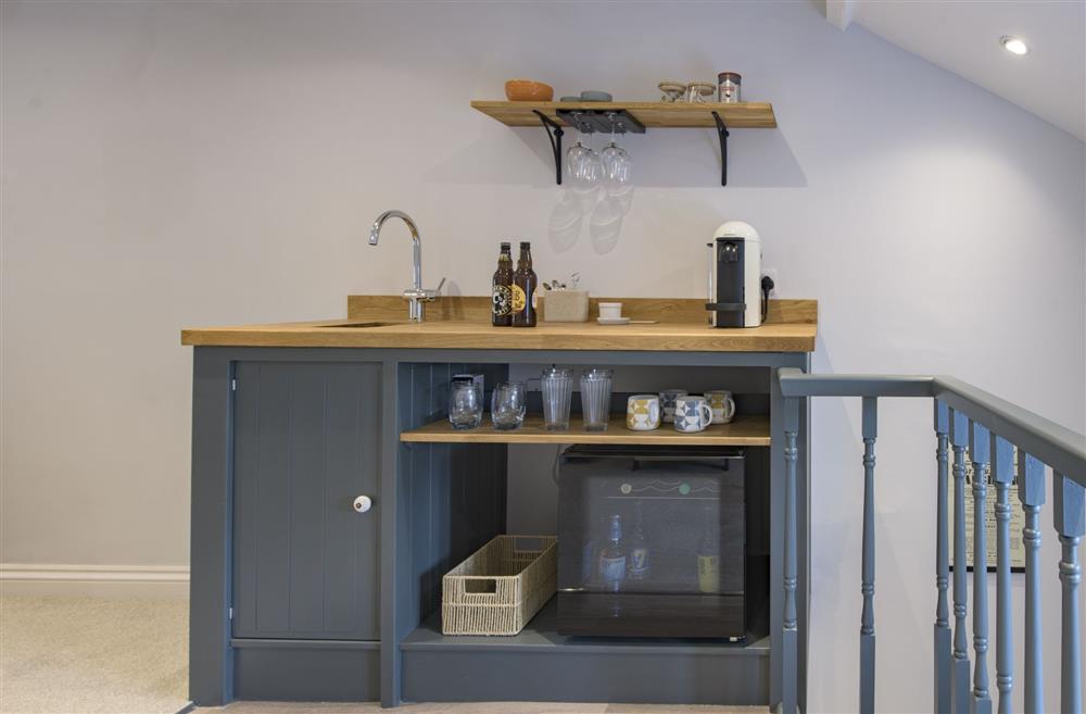 Bespoke drinks bar, fitted with mini fridge, coffee machine and sink at Penny Pot Cottage, Middleham, North Yorkshire