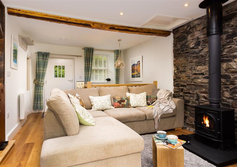 Relax in the living area at Pennys Cottage, Troutbeck