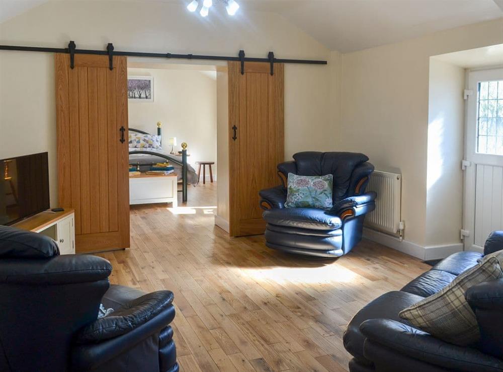 Comfortable living area (photo 2) at Penrhos Bach in Carmel, near Llangefni, Anglesey, Gwynedd