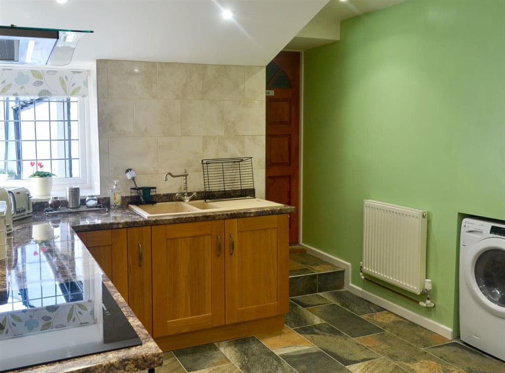 Modern fitted kitchen (photo 3) at Penrhos Bach in Carmel, near Llangefni, Anglesey, Gwynedd