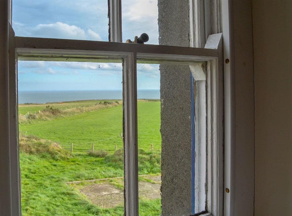 Sea views from the bedroom at Penrhyn Mawr in Pwllheli, Gwynedd