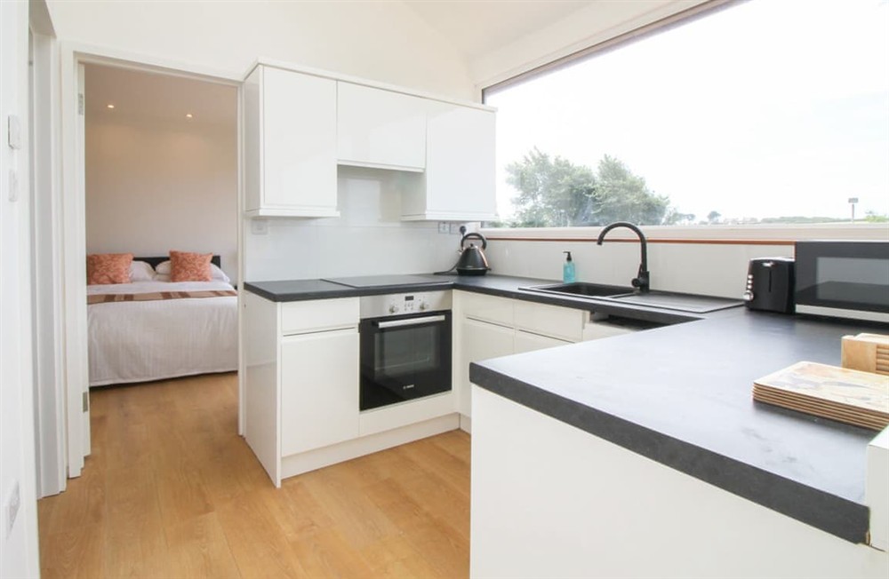 Kitchen area (photo 2) at Penrose Lodge in Newquay, Cornwall