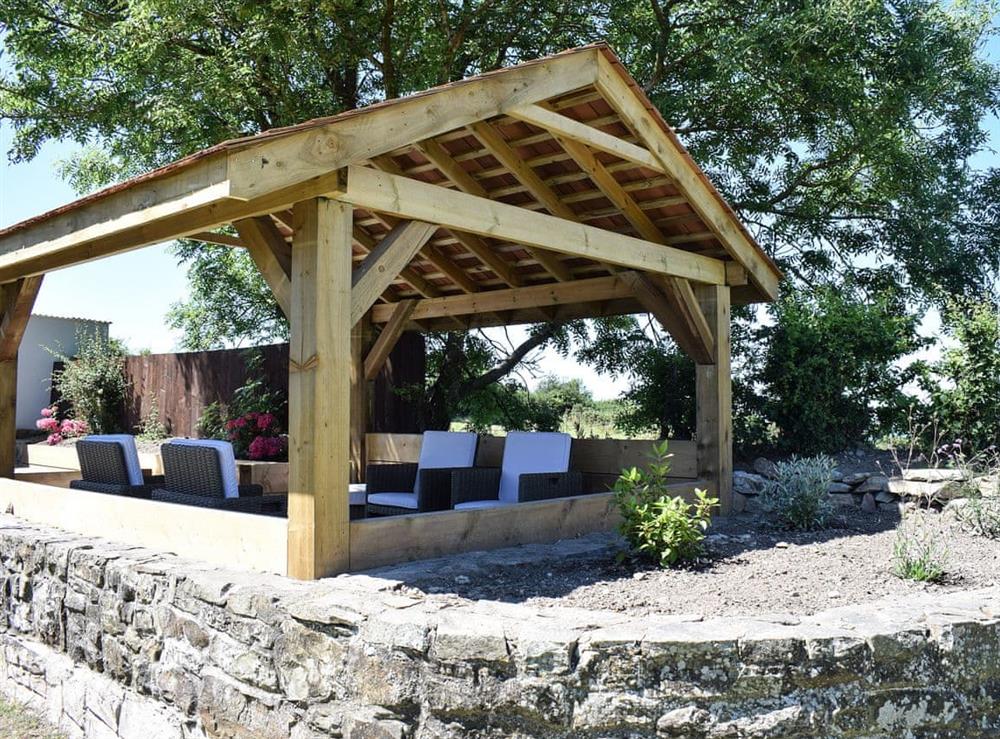 Outdoor seating area at Pensarnau in Sarnau, near Tresaith, Cardigan/Ceredigion, Dyfed