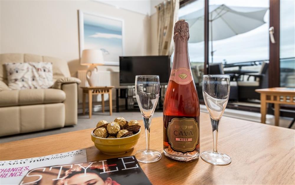 Relax in the comfy lounge with a glass of bubbles! at Penthouse in Maenporth