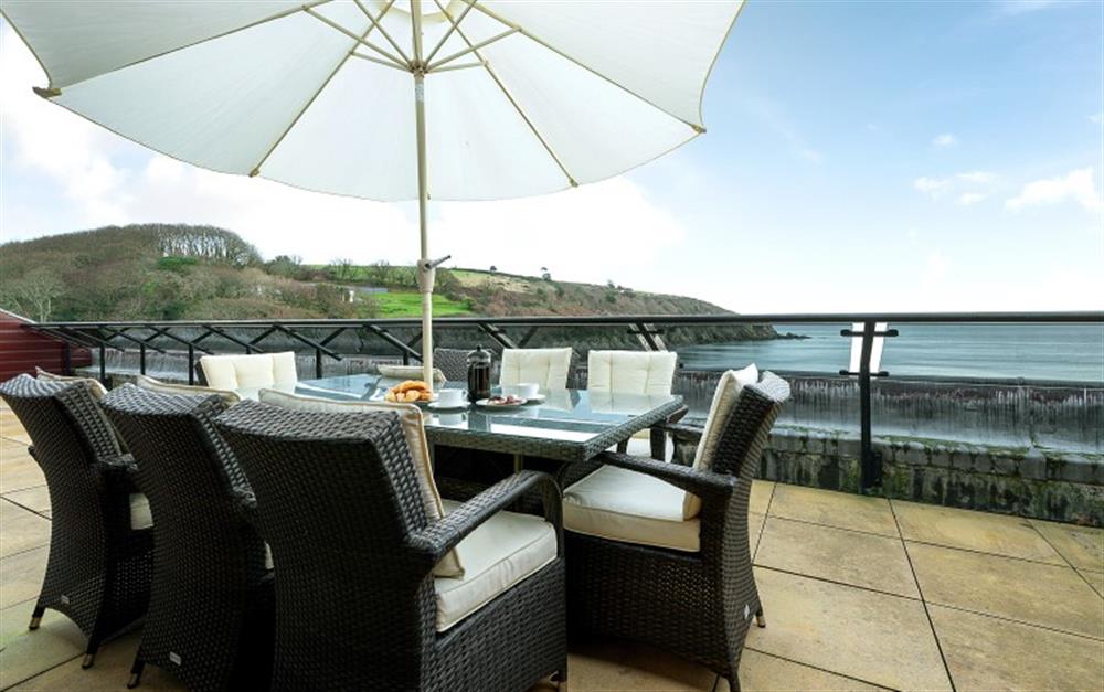 The Penthouse balcony provides such a fabulous outdoor space - perfect for alfresco dining or for chilling with a good book and a glass of wine. at Penthouse in Maenporth
