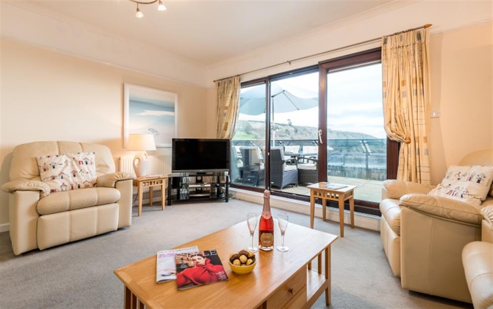 The spacious lounge area is both comfortable and attractive.  at Penthouse in Maenporth