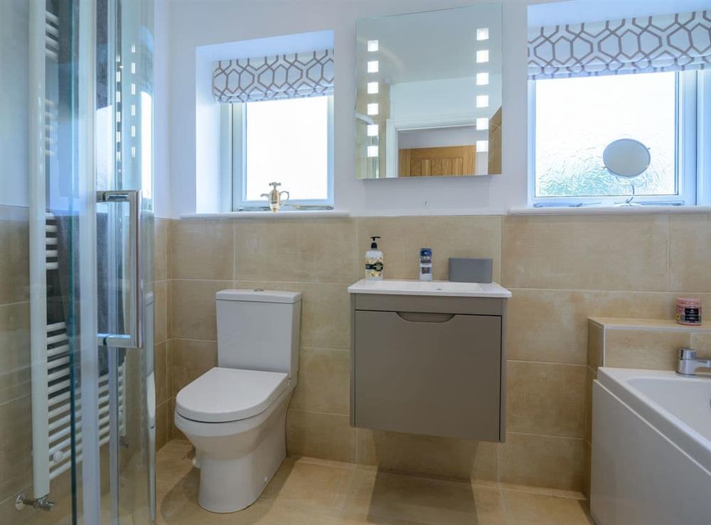 Bathroom with bath and shower cubicle at Penthwaite in Leyburn, North Yorkshire