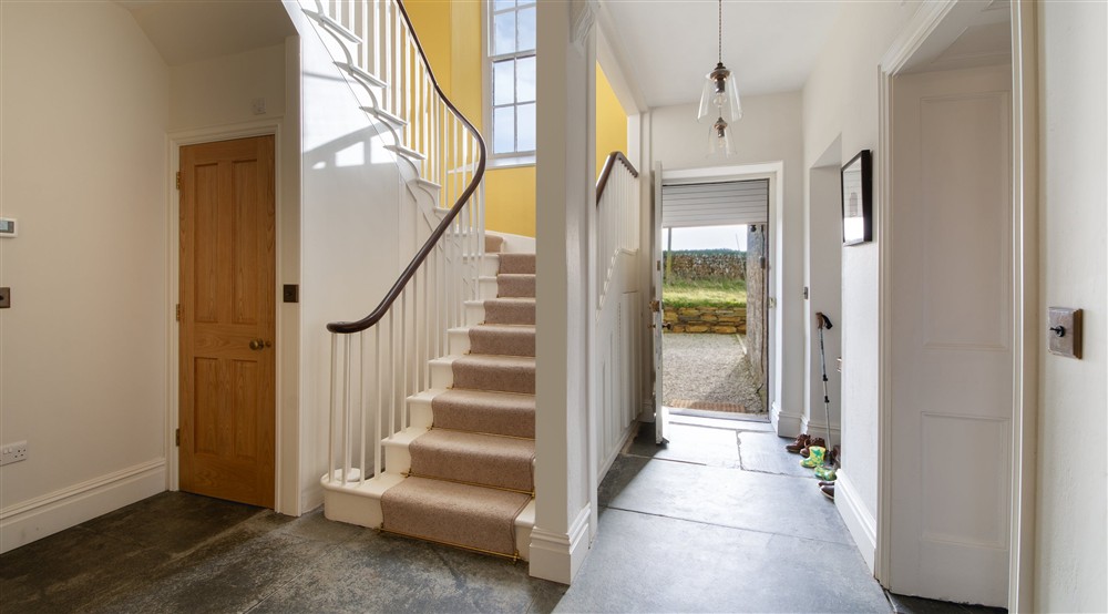 The entrance hall at Pentire Head Farmhouse in Polzeath, Cornwall