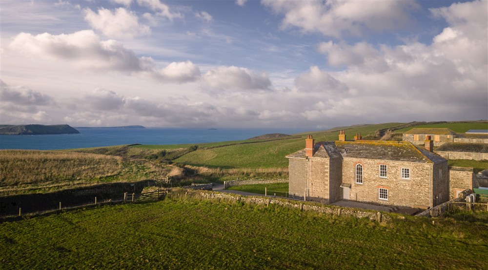 The exterior of Pentire Head Farmhouse and Pengirt, Cornwall at Pentire Head Farmhouse in Polzeath, Cornwall
