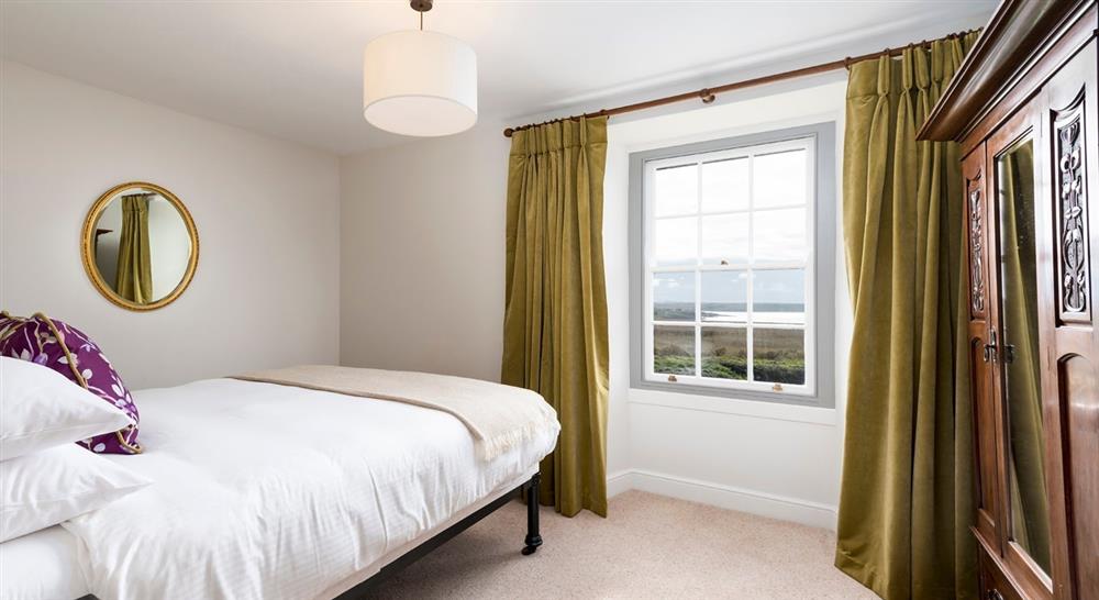 The first double bedroom at Pentire Head Farmhouse in Polzeath, Cornwall