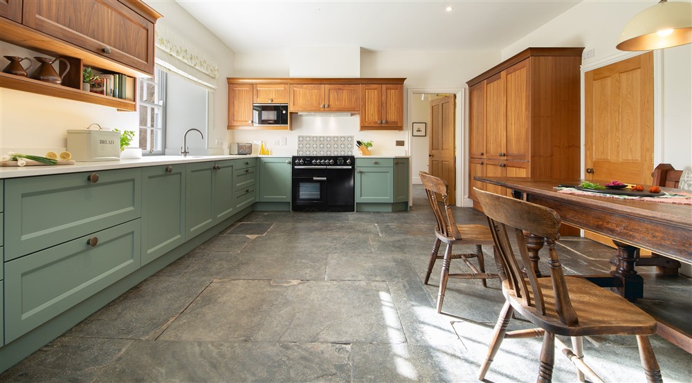 The kitchen and dining room (photo 2) at Pentire Head Farmhouse in Polzeath, Cornwall