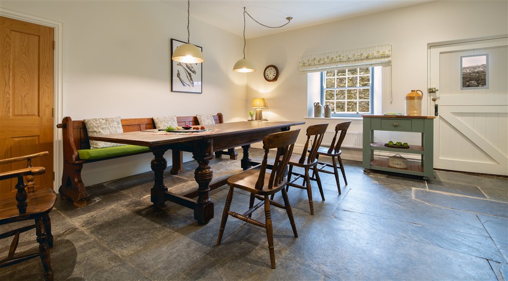 The kitchen and dining room (photo 3) at Pentire Head Farmhouse in Polzeath, Cornwall