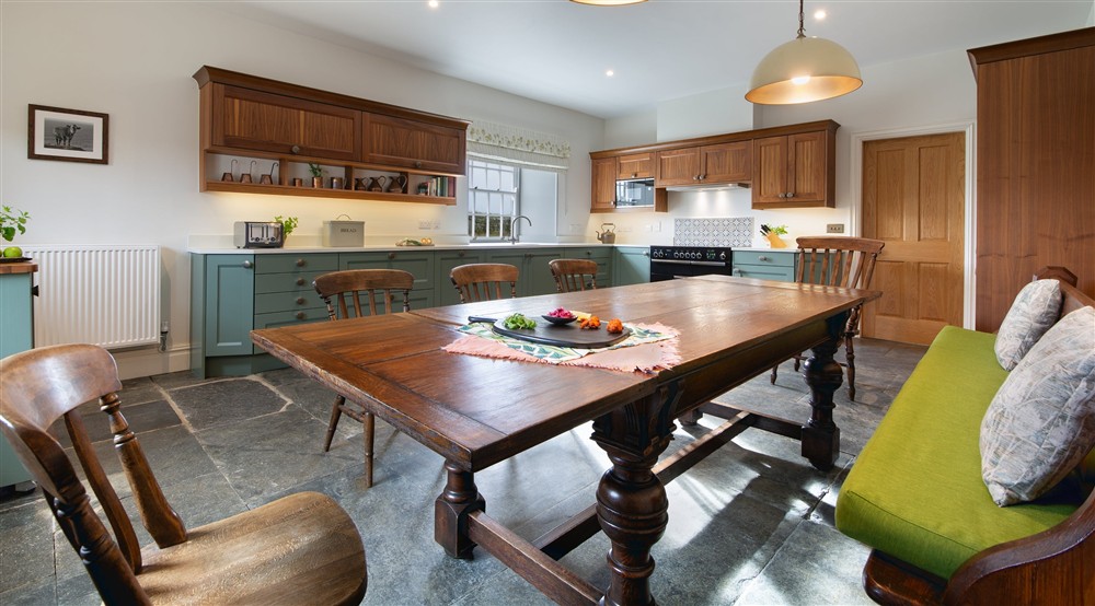 The kitchen and dining room at Pentire Head Farmhouse in Polzeath, Cornwall