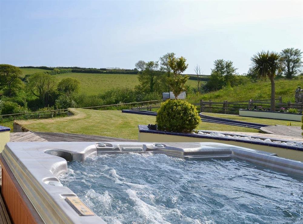 Luxurious hot tub with fantastic view at Pentire in Holbeton, near Ivybridge, Devon