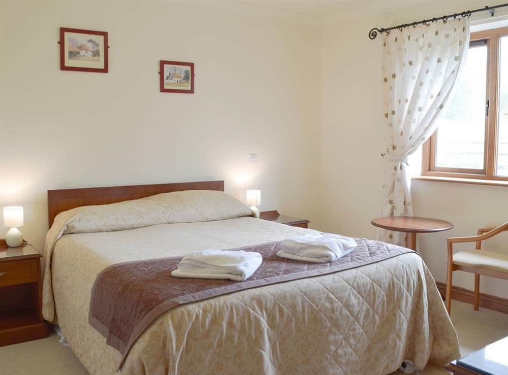 Comfortable double bedroom at Pentre Cottage in Ferryside, Dyfed