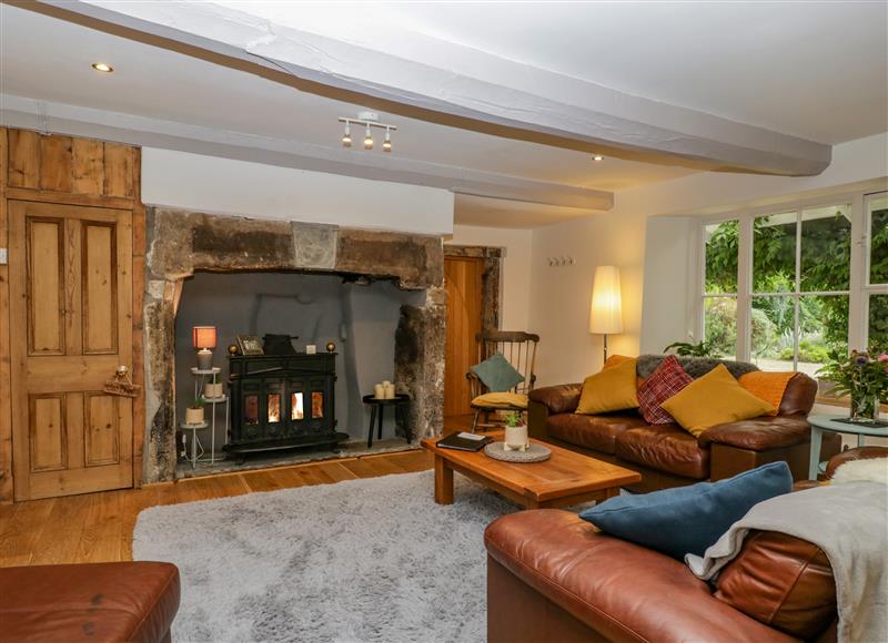 Relax in the living area at Pentre Court Cottage, Abergavenny