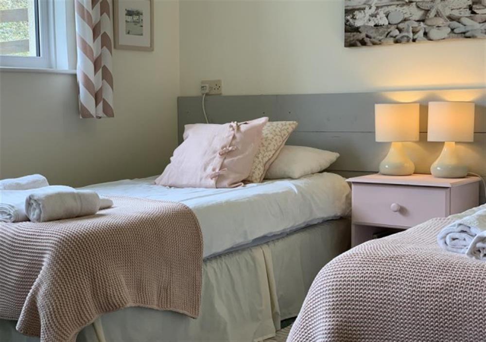 One of the ground floor twin bedrooms at Pentref in Roseland Peninsula