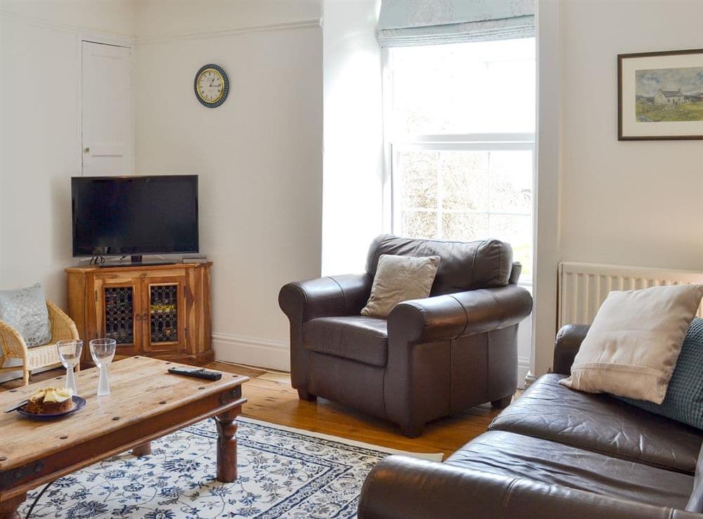Comfortable living room at Penwig Isaf in New Quay, Ceredigion, Dyfed