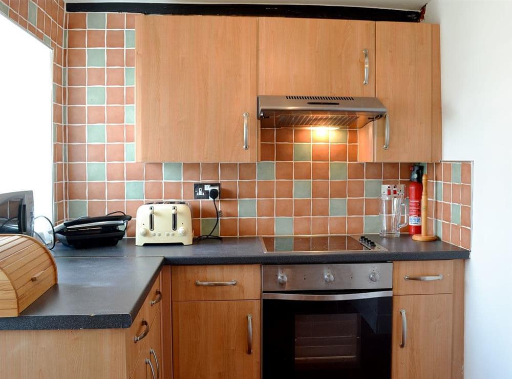 Compact, well equipped kitchen at Penwig Isaf in New Quay, Ceredigion, Dyfed