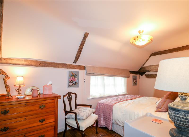 A bedroom in Peppermint Cottage at Peppermint Cottage, Petworth