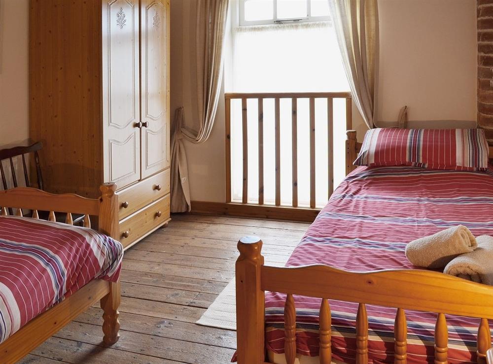 Twin bedroom at Peregrine Cottage in Flamborough, East Riding of Yorkshire