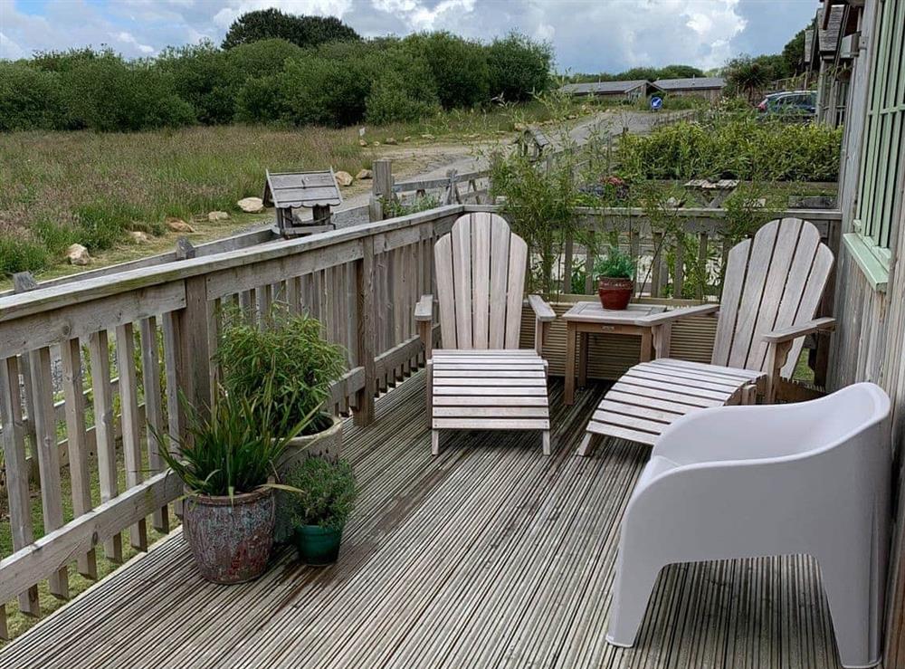 Front deck seating area at Peregrine Lodge in St Columb, near Padstow, Cornwall