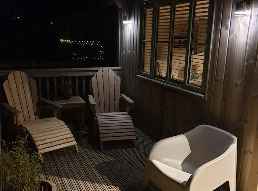 Solar-lit front deck at Peregrine Lodge in St Columb, near Padstow, Cornwall