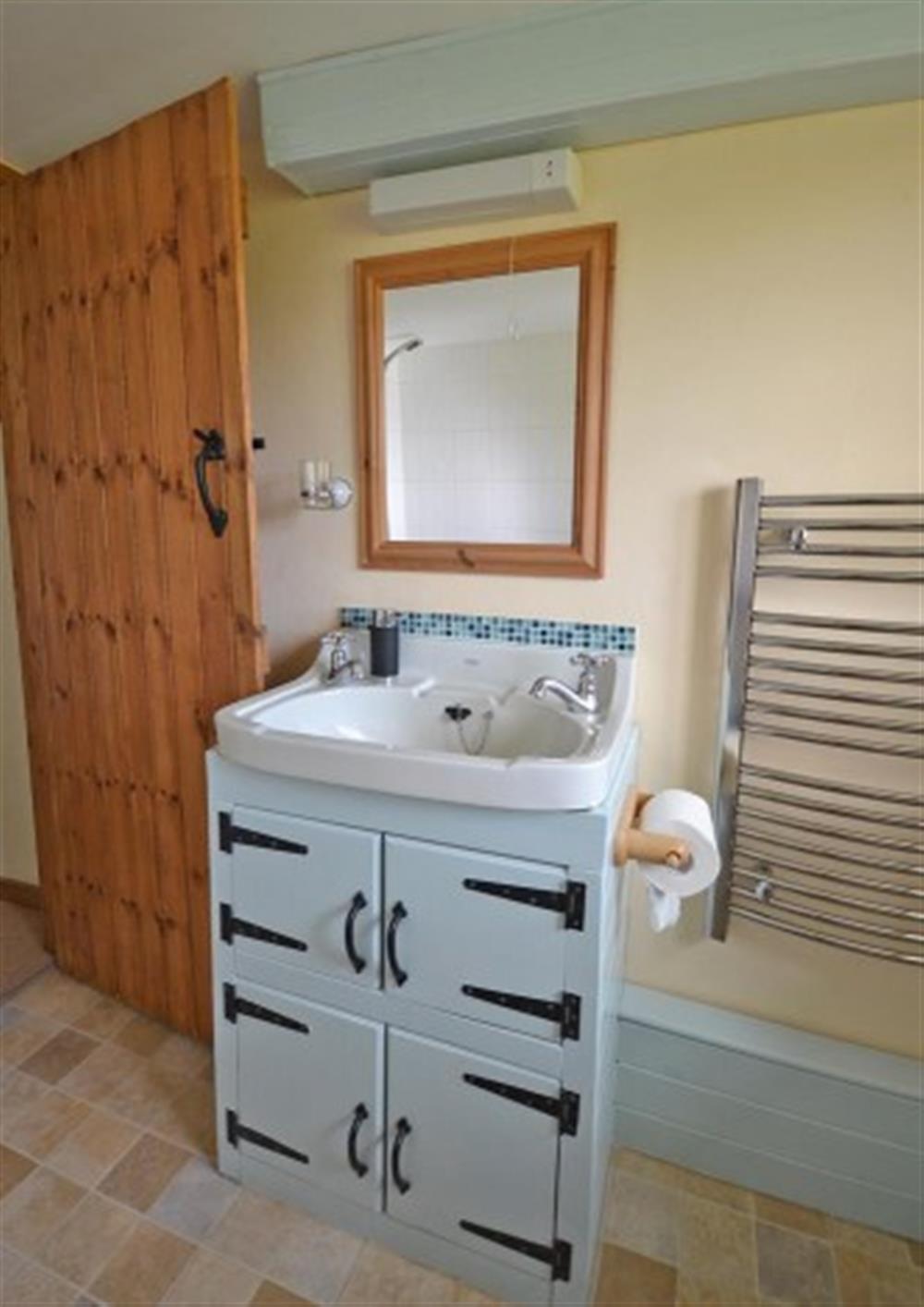 A country cottage bathroom at Perhay Cottage in Bridport