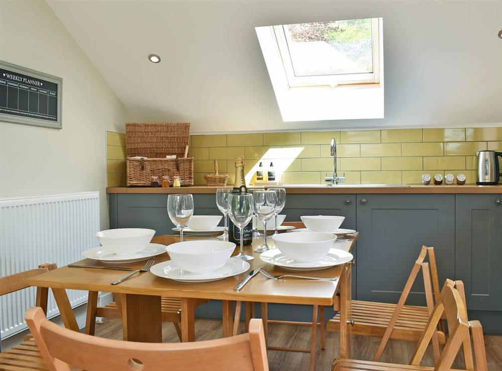 Thoughtfully converted kitchen/dining room at Perivale Lodge in near Lydney, Gloucestershire