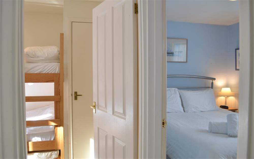 Both bedrooms lead off from the living room at Periwinkle in Helford Passage