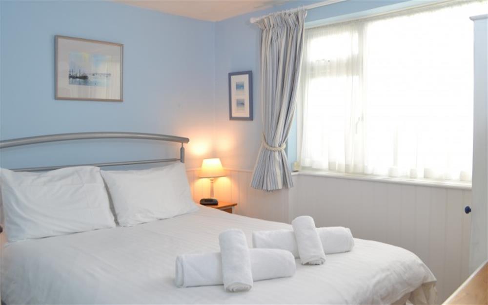 You'll love the bedroom, decorated in a relaxing shade of blue. at Periwinkle in Helford Passage