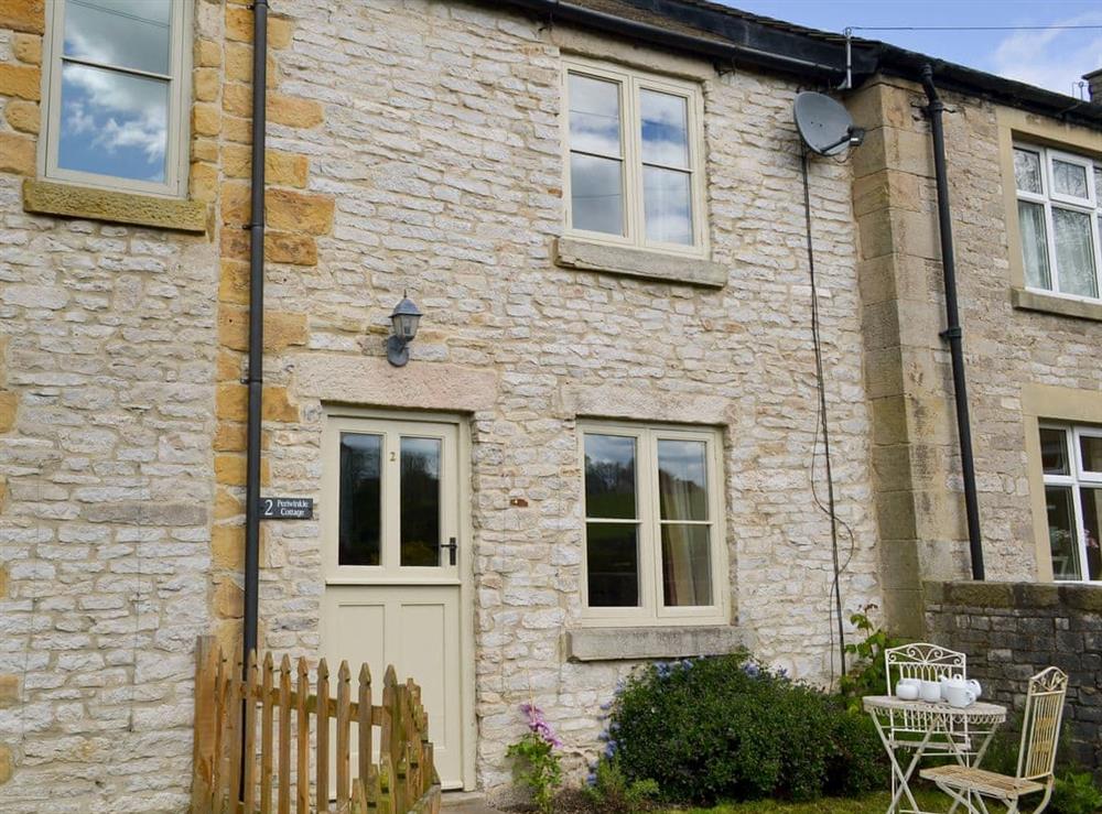Terraced, natural stone-built cottage at Perriwinkle Cottage in Great Longstone, near Bakewell, Derbyshire