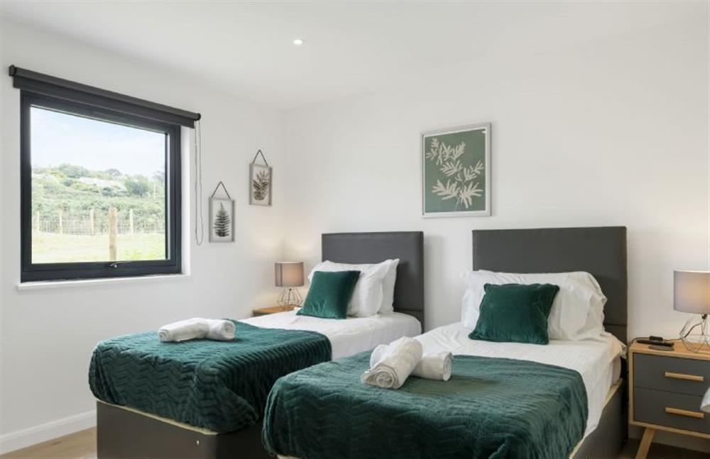Perrywinkle, Praa Sands. Bedroom two with twin 3’ single beds, available as super-king on request.