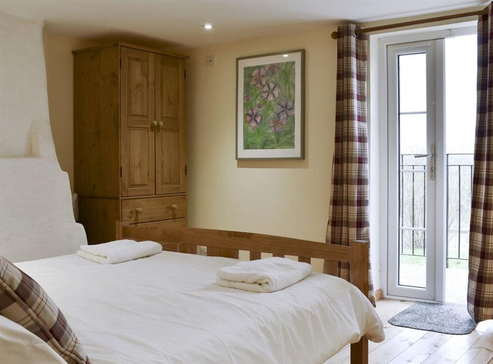Attractive double bedroom at Pershbrook Cottage in Minsterworth, near Gloucester, Gloucestershire