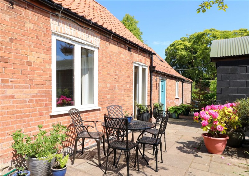 Enjoy a cup of tea on the patio at Petal Cottage, Laxton near Tuxford