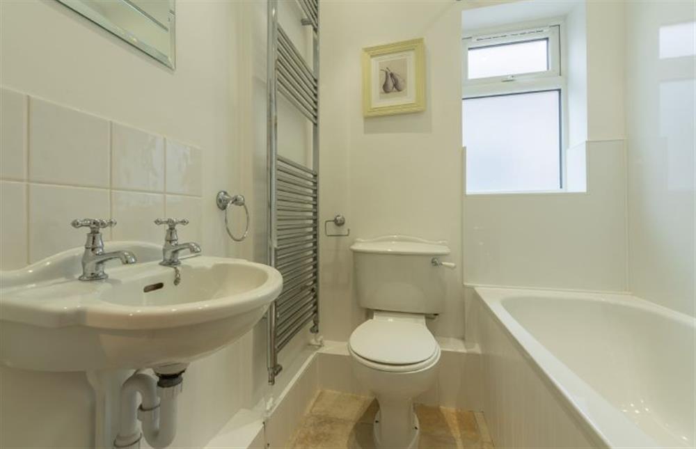 Ground floor: Bathroom with bath and shower over at Petts Cottage, Burnham Market near Kings Lynn