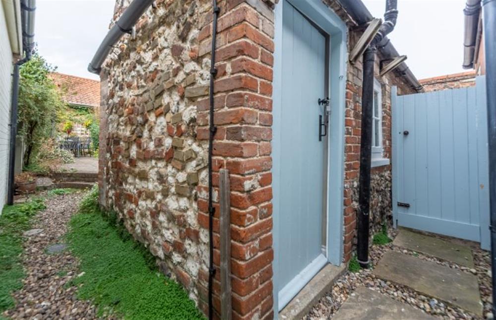 Outside there is a utility room at Petts Cottage, Burnham Market near Kings Lynn