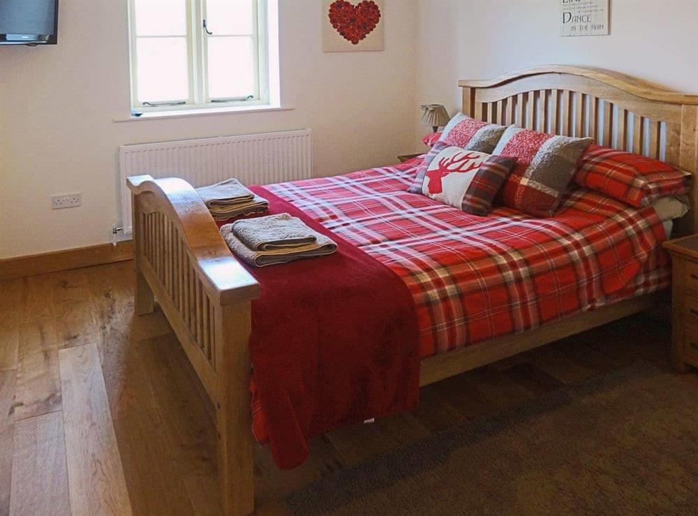 Comfortable double bedroom with TV at Pheasant Fields in Lloc, near Holywell, Clwyd