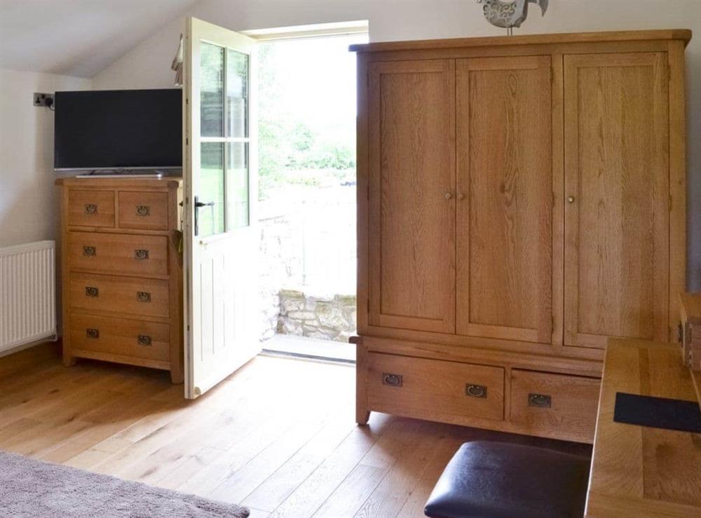 Cosy double bedroom with TV at Pheasant Fields in Lloc, near Holywell, Clwyd