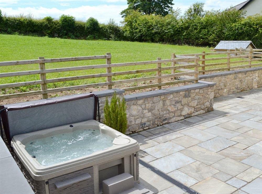 Relax in your own 6-seater hot tub at Pheasant Fields in Lloc, near Holywell, Clwyd