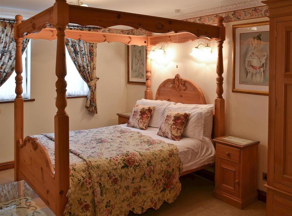 Four poster bedroom at Pheasant Roost in Swanton Morley, The Heart of Norfolk, Great Britain