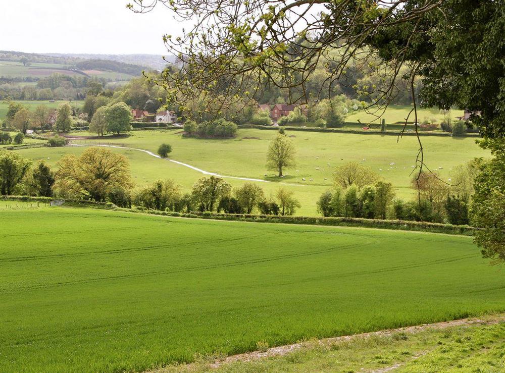 The surrounding valley is beautiful and green at Pheasants Hill Old Byre in Hambleden, near Henley-on-Thames, Buckinghamshire, England