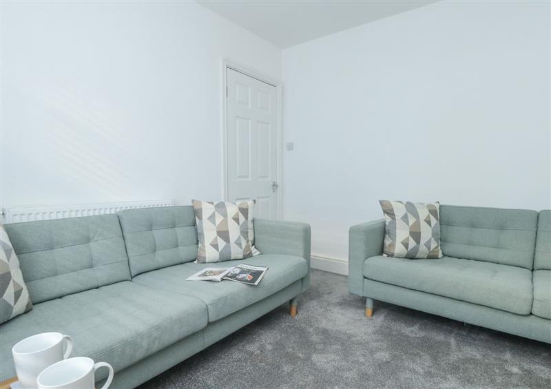 Relax in the living area at Picardy Cottage, Weymouth