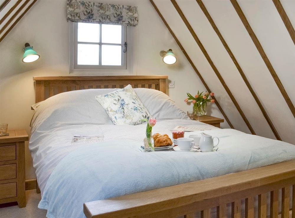 Comfortable double bed at Pickdick Stable in Brede, near Rye, East Sussex