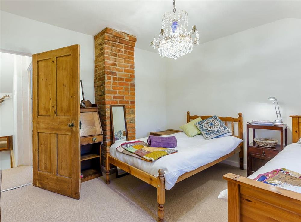 Twin bedroom at Pickle Cottage in Freshwater, Isle of Wight