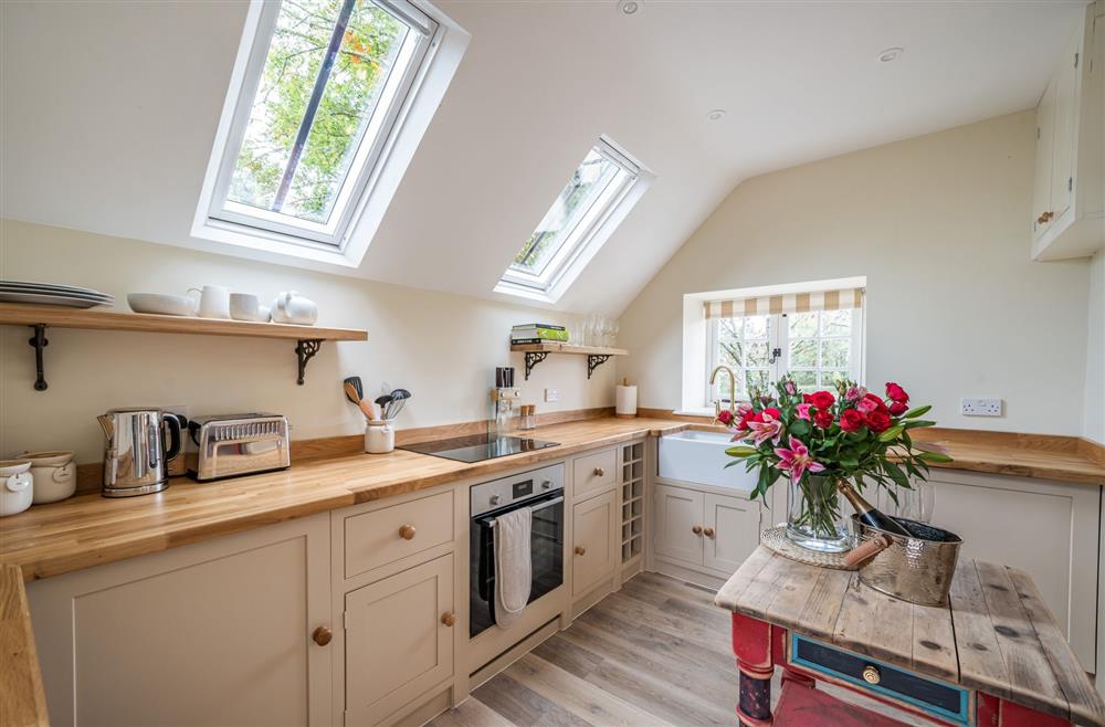 The light and airy kitchen with Velux windows, at Piddle Cottage at Piddle and Puddle, Dorchester