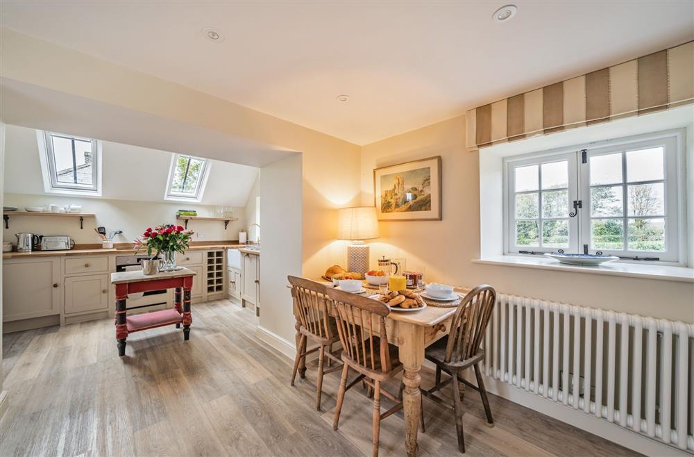 The open-plan kitchen and dining area at Piddle Cottage at Piddle and Puddle, Dorchester