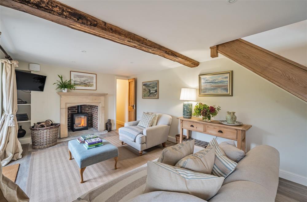 The sitting area with wooden beams at Piddle Cottage at Piddle and Puddle, Dorchester