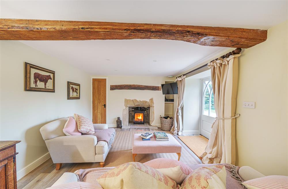 The sitting area with wooden beams at Puddle Cottage at Piddle and Puddle, Dorchester