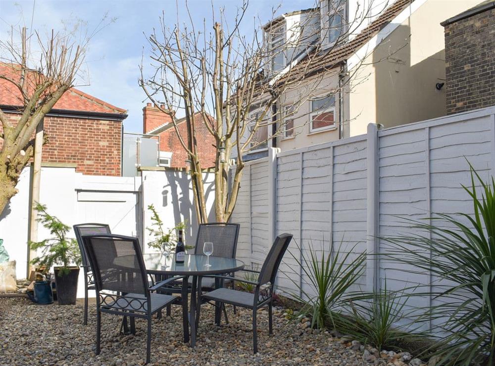 Enclosed furnished courtyard at rear at Pier View in Gorleston-on-Sea, Norfolk